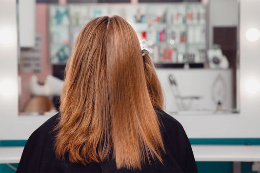 Before and after image showcasing the transformative effects of the GK Hair keratin treatment, from frizzy to silky smooth hair.